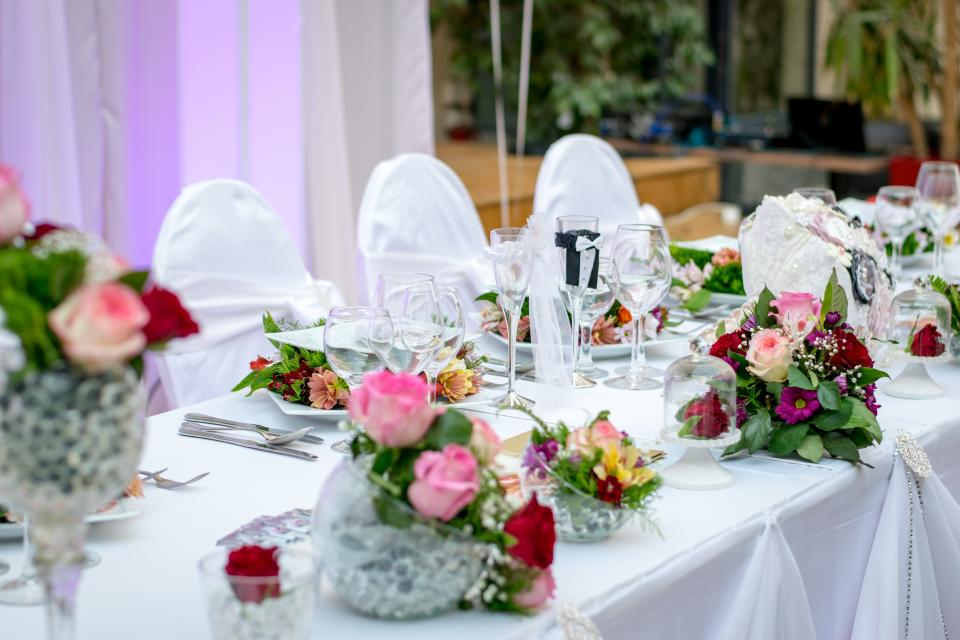 Top table styled with floral centrepieces